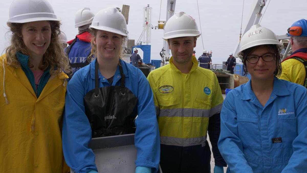 Four biologists on deck