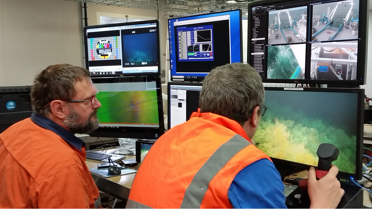 Two technicians operating the deep-tow camera system